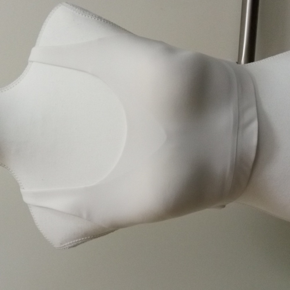 Sports bra, 34 D unbranded sample, strong support.  Washed but not worn.
